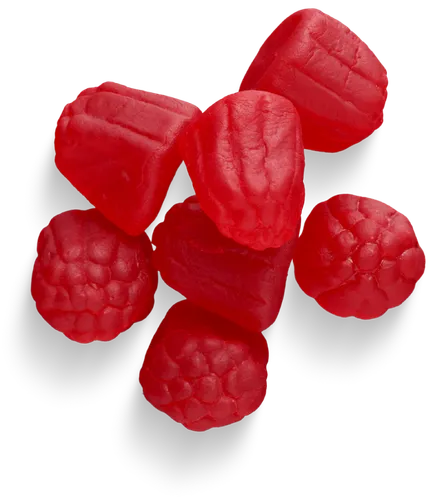 Gomitas de vitaminas rojas sin azúcar con forma de frambuesas, fabricadas por laboratorio de maquila en México.